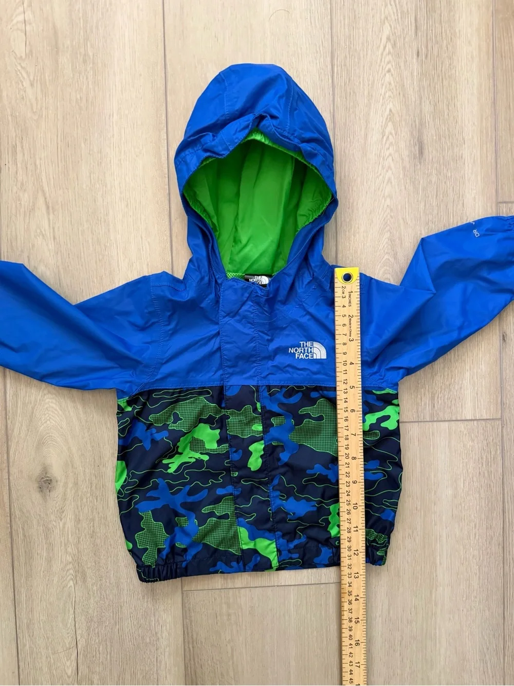 The North Face Royal Blue Hooded Jacket with Green Camo Panels